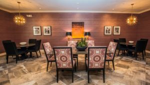 dining area with several chairs and tables